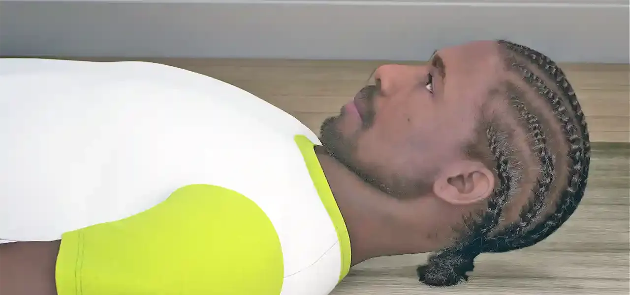Person lying supine performing the deep neck flexor endurance test with a chin tuck and the head lifted slightly off the surface