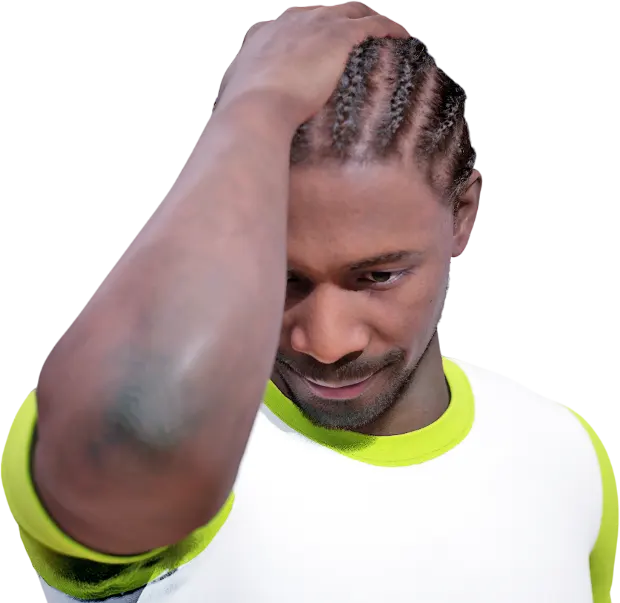 Man performing a levator scapulae stretch by turning his head and looking downward to relieve tightness in the neck and shoulder blade